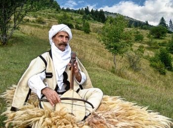 Musician in traditional dress - Albania holidays