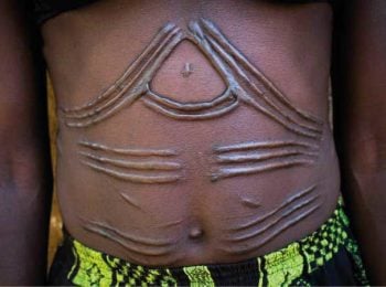 Woman with traditional scarifications - South Sudan tour