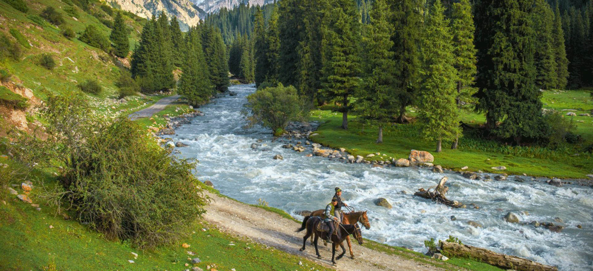 Kyrgyz men on horseback - Central Asia holidays