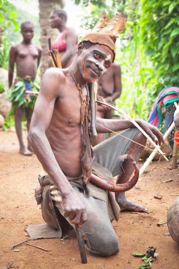 Koma man with traditional musical instrument - Cameroon tour
