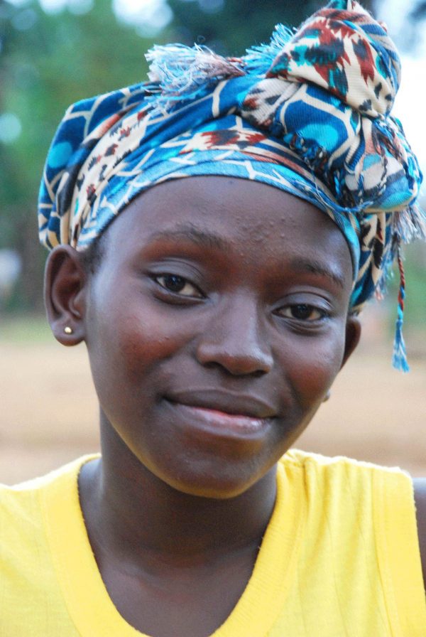Young woman in forest village - Gabon tour