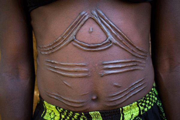 Woman with traditional scarifications - South Sudan tour
