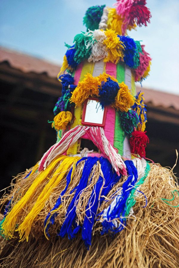 Masked dancer in Sierra Leone - Sierra Leone holidays