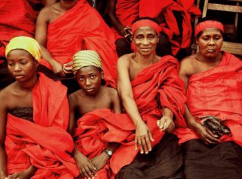 Women in traditional dress at Ashanti funeral - Ghana holidays and tours