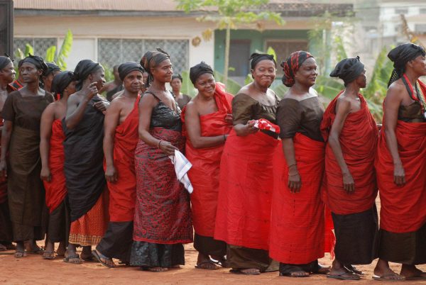 Women in traditional dress at Ashanti funeral - Ghana tours