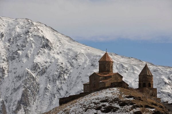 Kazbegi church in Caucasus mountains - Georgia tours and holidays