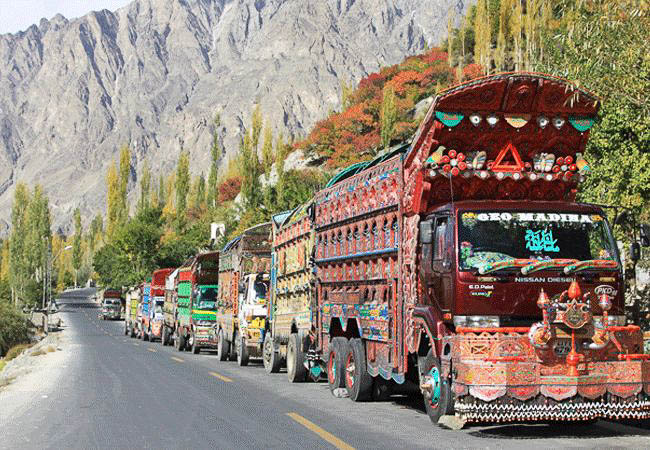 Colourfully decorated trucks on the road - Pakistan tours