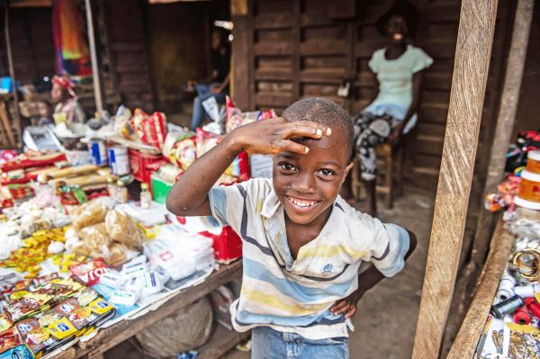 Young boy in Freetown market - Sierra Leone tours and holidays