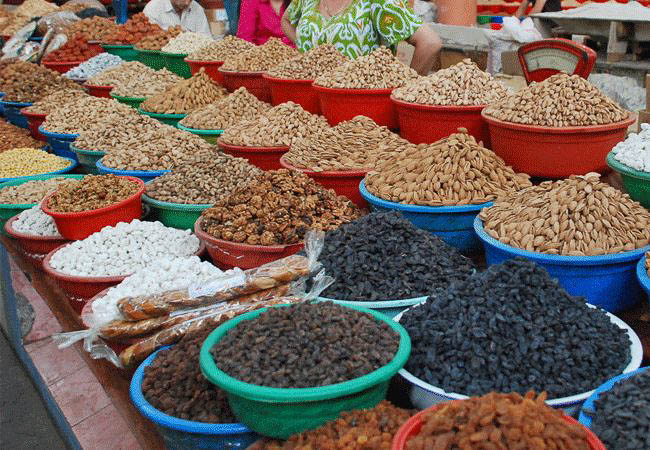 Dried fruits and nuts in Tajik market - Central Asia holidays