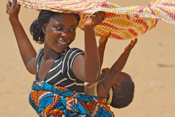 Woman nd baby in Benin village - West Africa tour