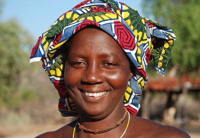 Village woman with colourful headdress - Angola holidays