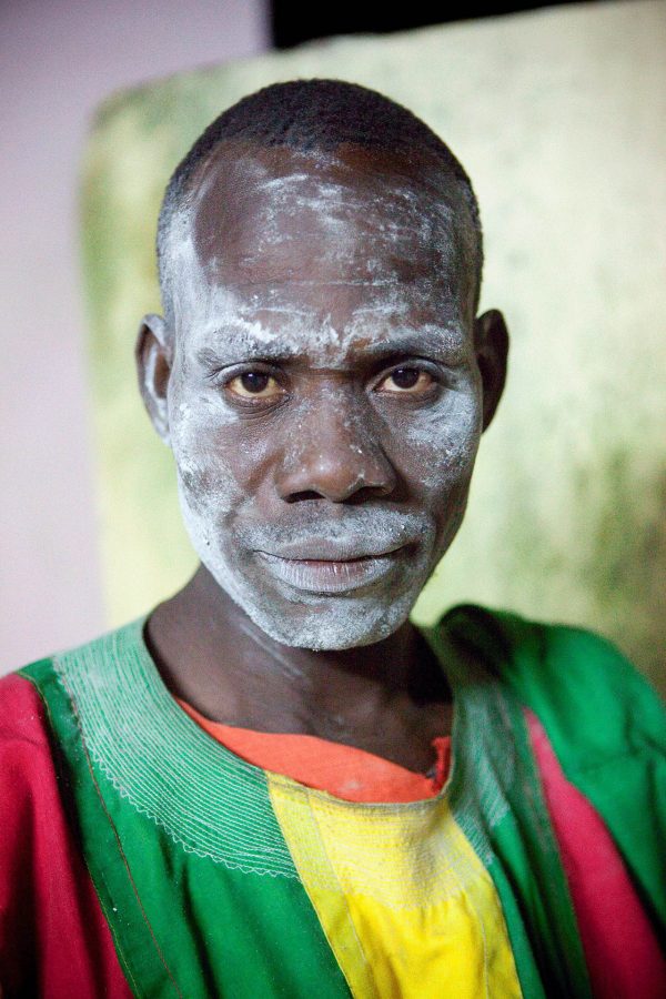 Man with painted face in Cameroon - Cameroon holidays