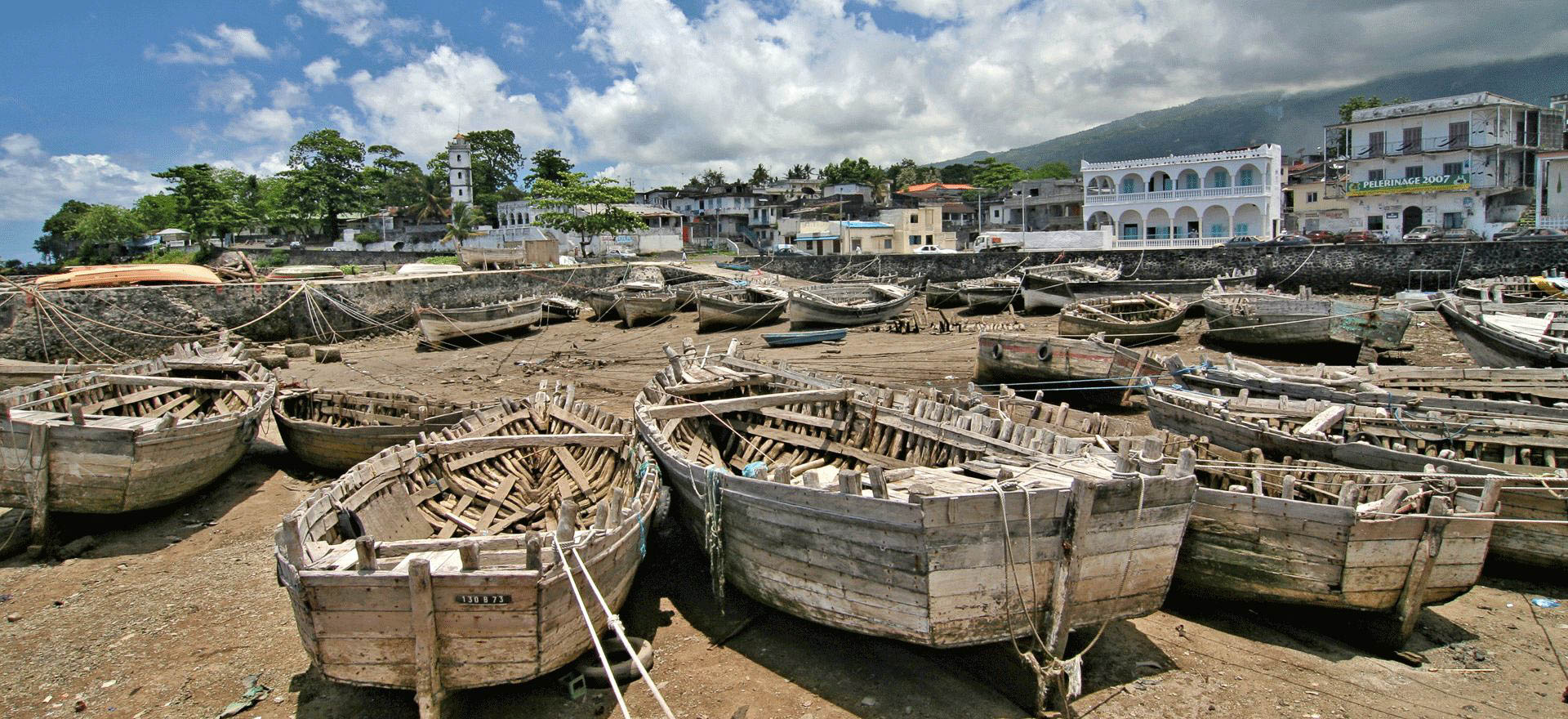 Traditional wooden fishing boats on the beach - Comoros holidays and tours