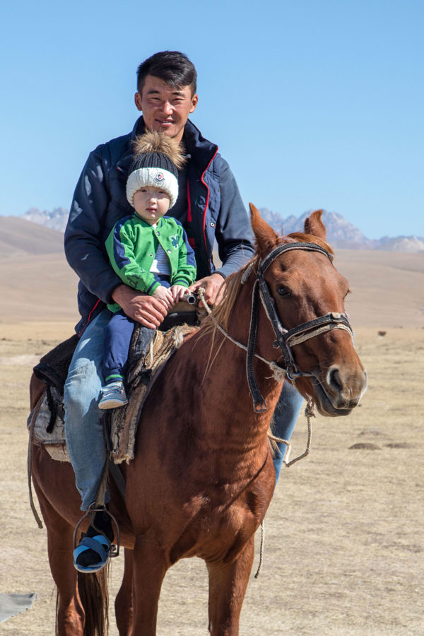 Father and son in the Kyzyl Kum desert - Central Asia holidays