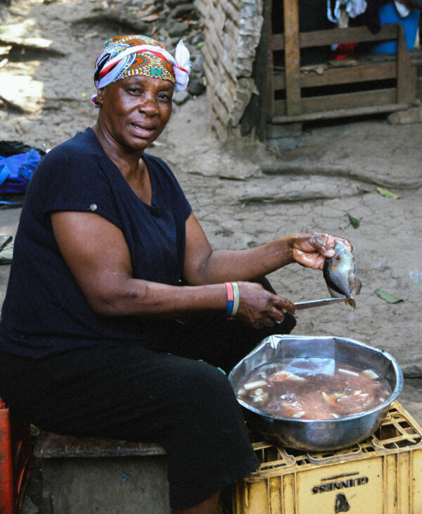 Equatorial Guinea - woman cleaning fish