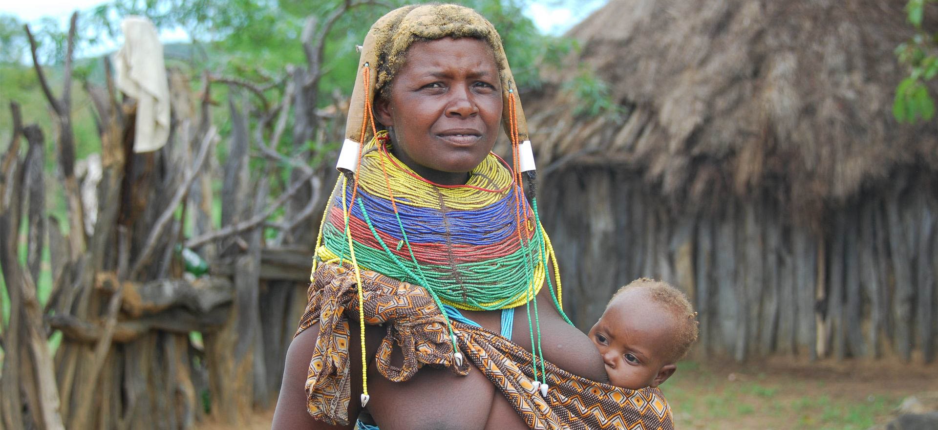 Angola holidays - Muila woman with baby