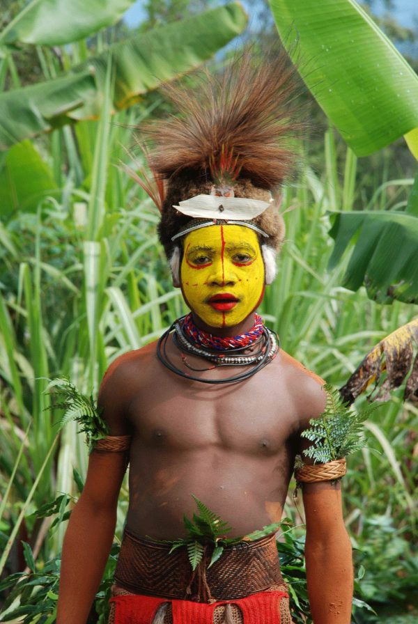 Boy with painted face - Papua New Guinea holidays