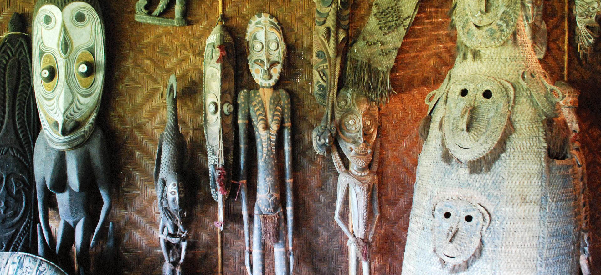 Carved masks and figures - Papua New Guinea holidays and tours