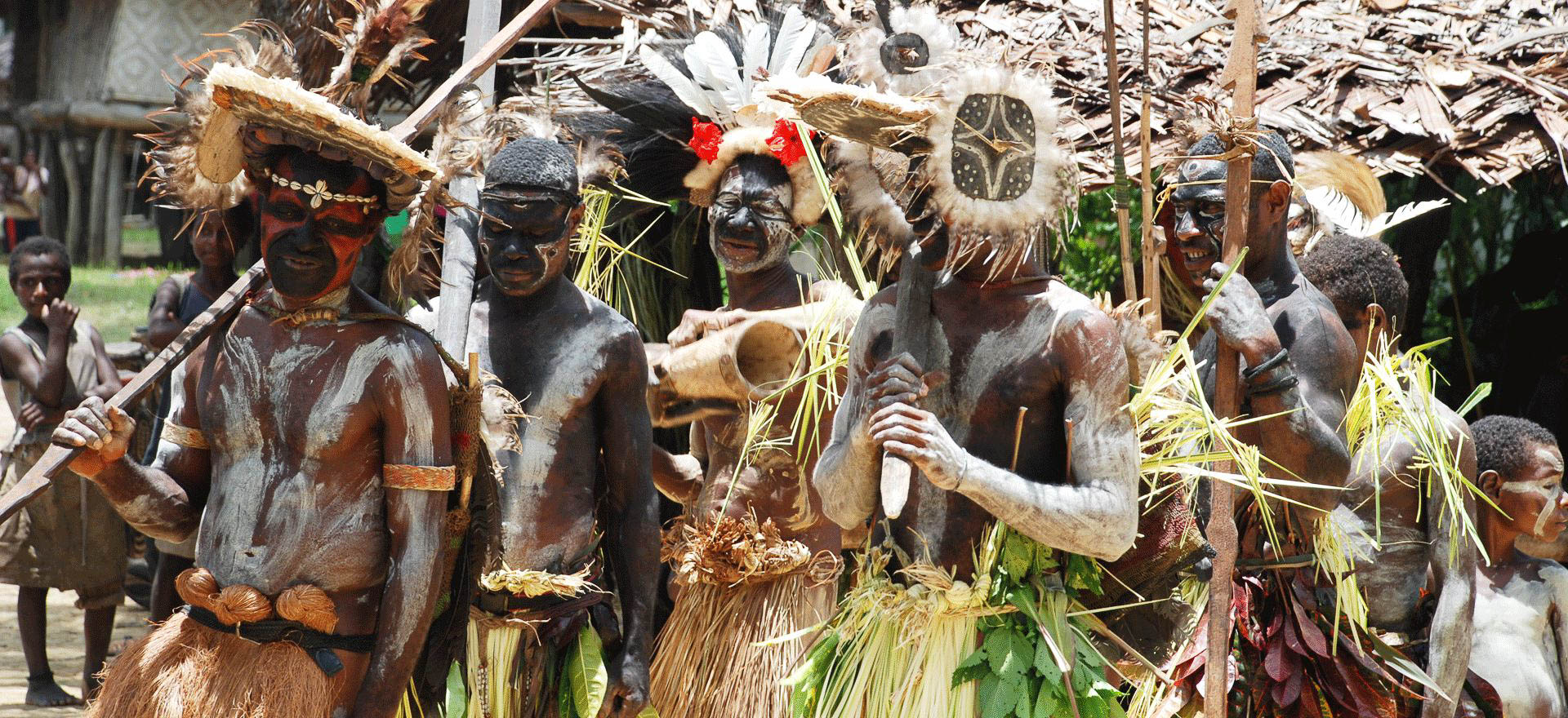 Men performing traditional dance on the Sepik River - Papua New Guinea Holidays and Tours