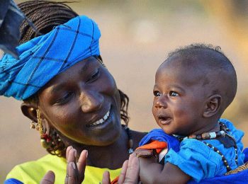 Fulani woman and baby - Senegal holiday