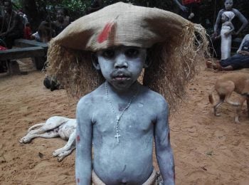 Gabon Holidays and Tours - Young boy at Bwiti ceremony