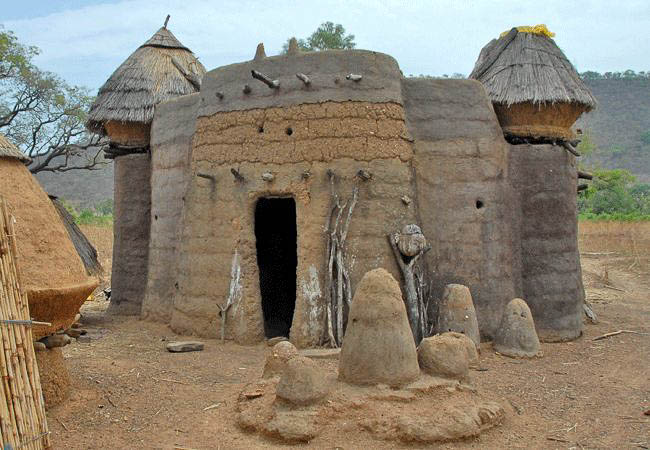 Togo Holidays and Tours - Photo of traditional Tamberma house with shrine outside