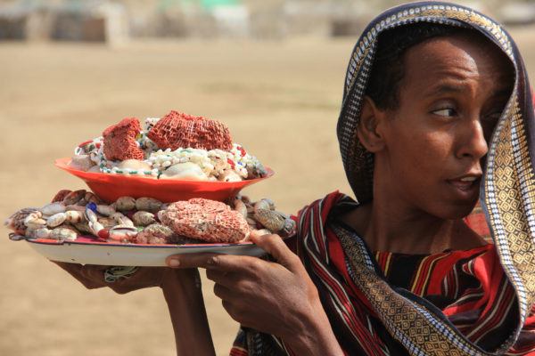 Woman selling shells near Massawa - Eritrea holidays and tours