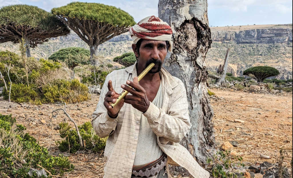 Man playing flute in Socotra