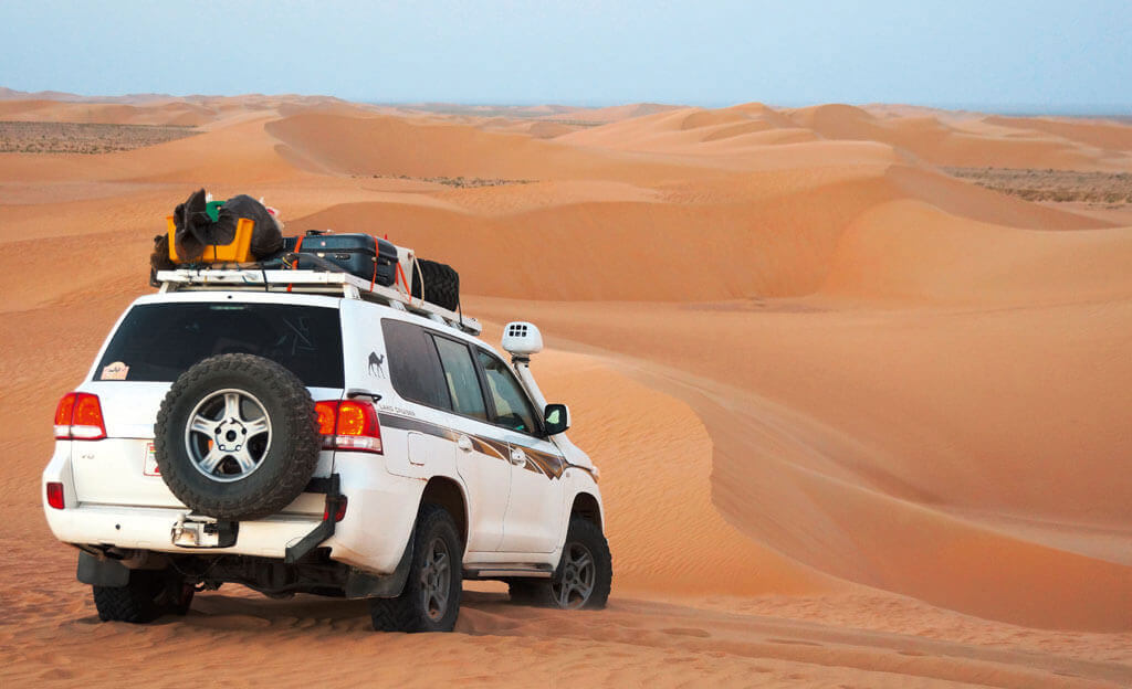 4WD in desert, ahead of setting up camp
