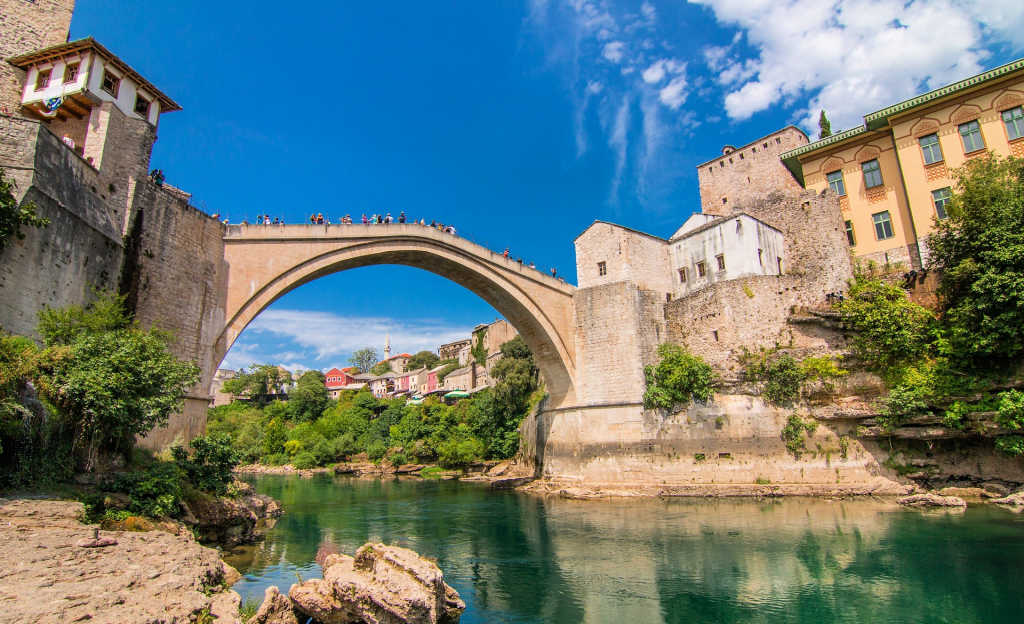 16th-century Ottoman bridge in the city of Mostar in Bosnia and Herzegovina, visit on our alternative Europe holidays
