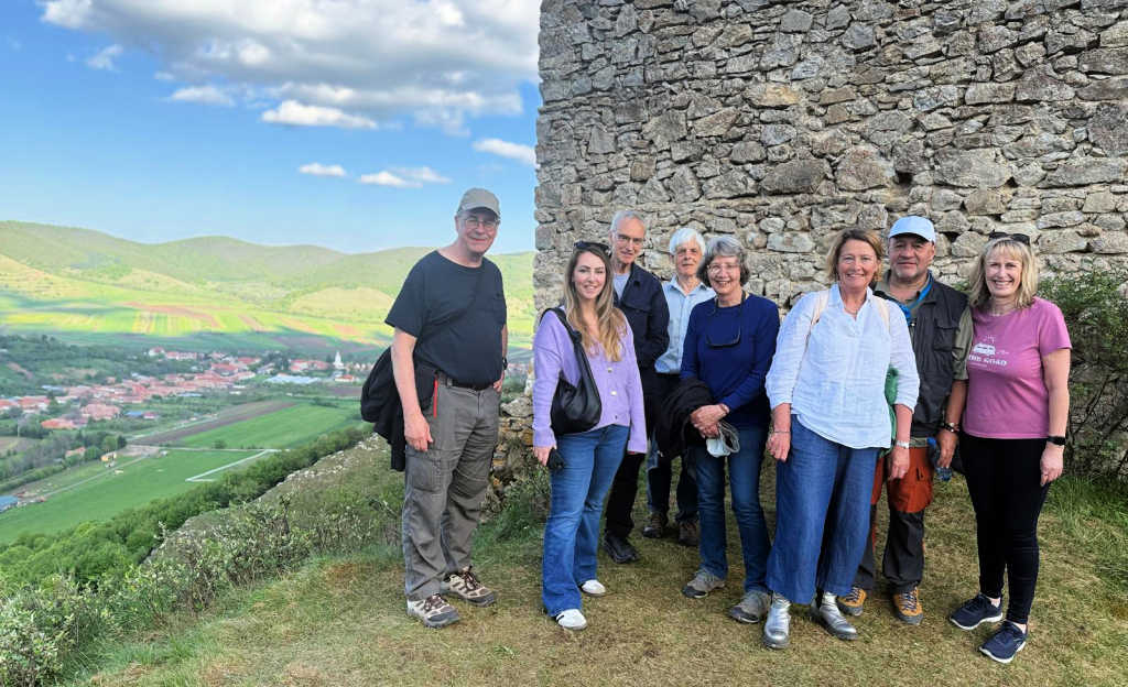 Tour group at top of fortress on visit to Romania with Native Eye Travel