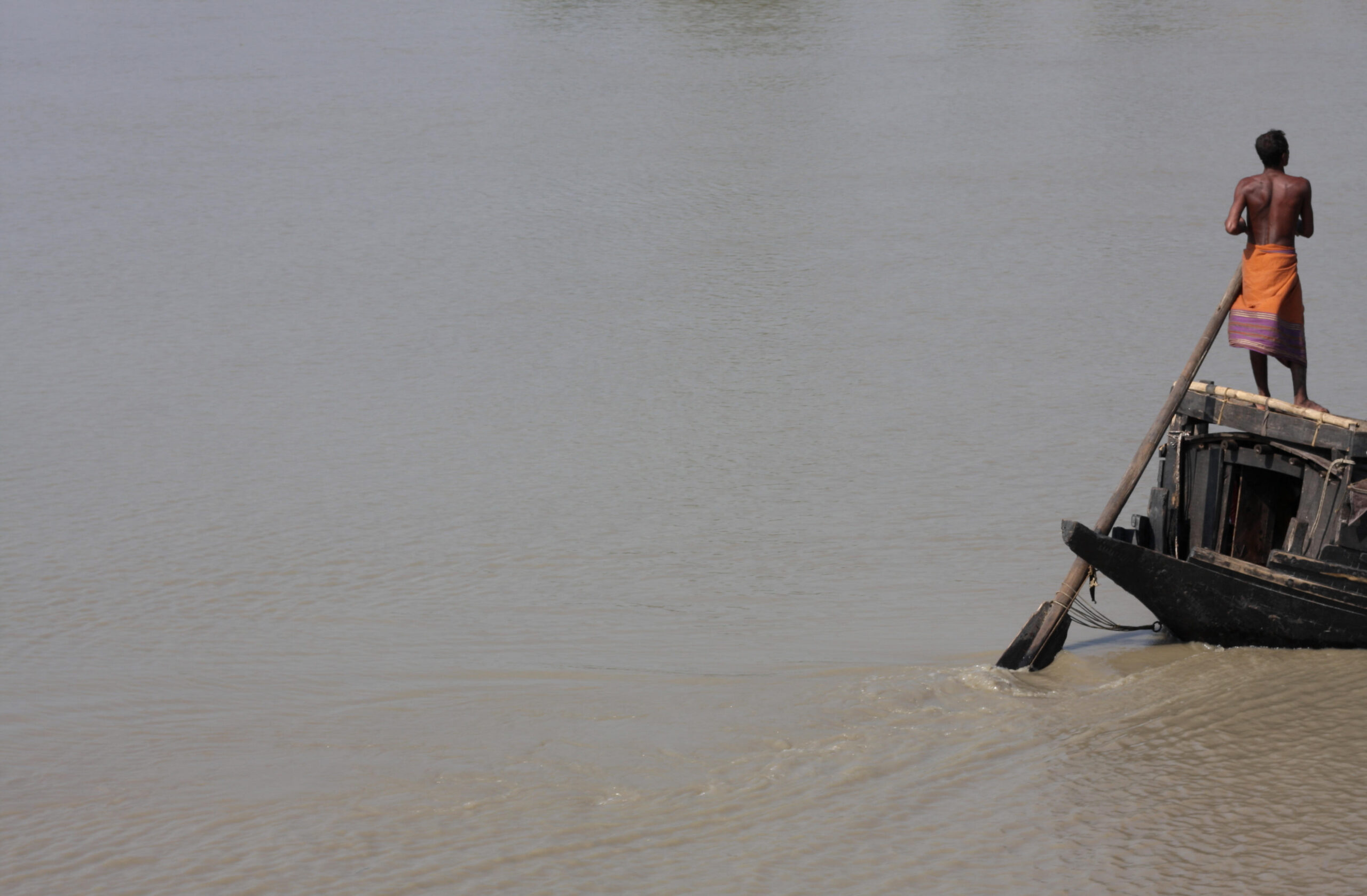 Boatman heads into the Sundarbans